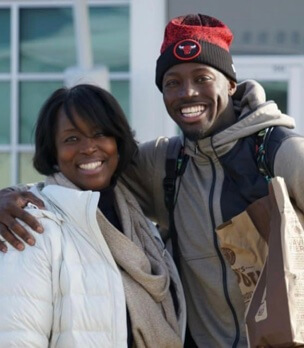 Beverly Grant with her son, Jerian Grant.